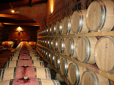 brown wooden wine barrel lot inside room thumbnail