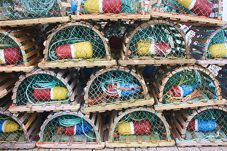 pile of dome-shaped brown wooden animal trap lot thumbnail