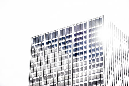 low-angle photo of white building thumbnail