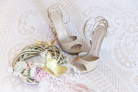 pair of women's white leather peep-toe stilettos thumbnail