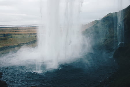 waterfall during daytime thumbnail