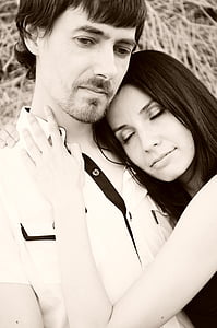 woman hugging man near stack of hay thumbnail