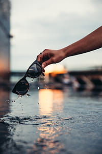 Sunglasses Making A Splash Photo thumbnail