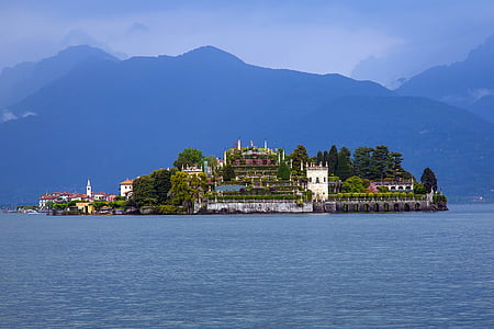 island with high-rise building landscape photography thumbnail