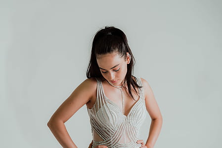 woman wearing white sleeveless top thumbnail