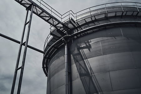 gray scale photo of building with stairs thumbnail