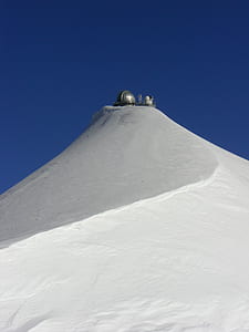 Gray Round Weather Device on Top of Snow Coated Mountain during Daytime thumbnail