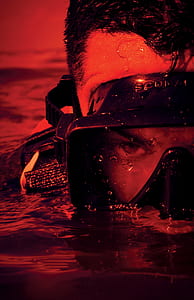 close-up photo of man wearing goggles thumbnail