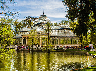 glass house in front of lake thumbnail