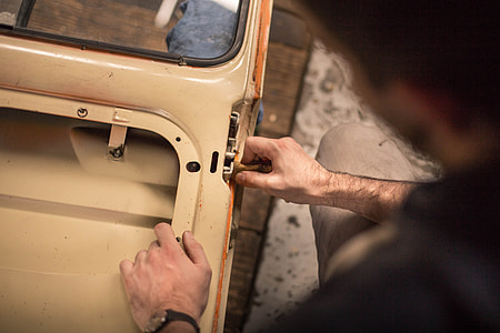 person holding car frame thumbnail