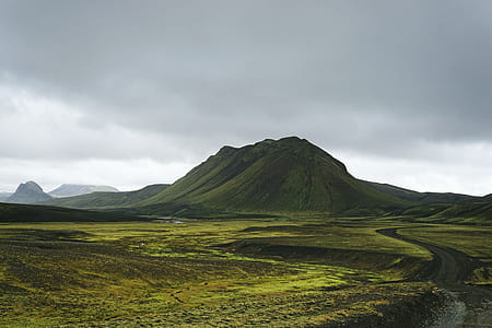 green mountain under gray clouds thumbnail
