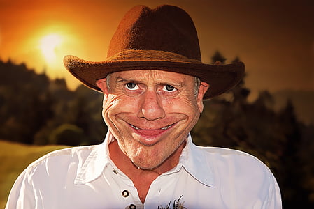 closeup photo of man's white polo shirt and brown cowboy hat thumbnail