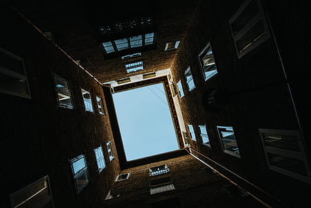 low angle photography of brown building thumbnail