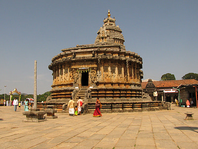 Old Temple in India with religious visitors thumbnail