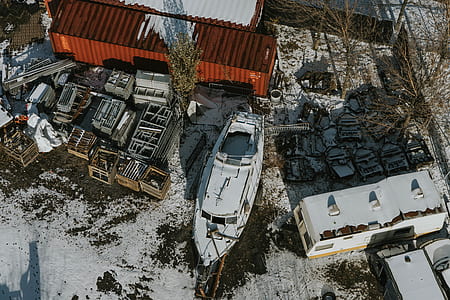 bird's eye photography of white power boat thumbnail