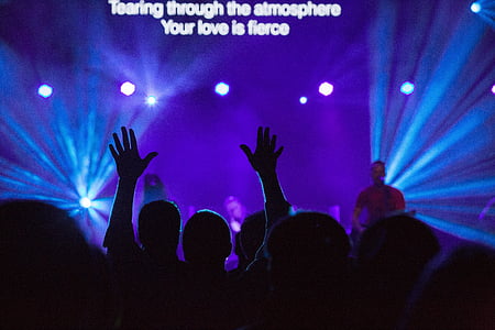 group of people standing in front of stage thumbnail