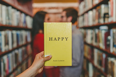 selective focus of Happy book by alex Lemon thumbnail