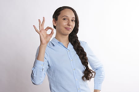 woman in blue dress shirt thumbnail