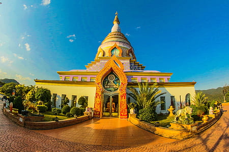 White Buddhist Temple With Blue Cloudy Background thumbnail