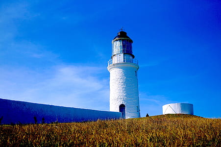 low angle photography of light tower thumbnail