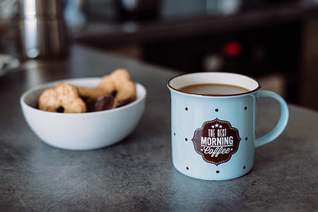 Ceramic Mug Beside White Ceramic Bowl thumbnail