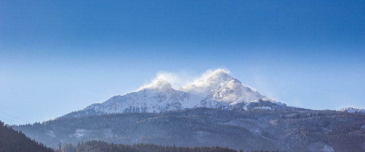 snow-covered mountain under blue clear sunny sky thumbnail