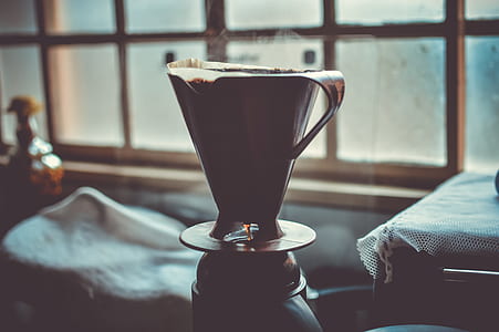 close-up photo of black pitcher inside dark room thumbnail