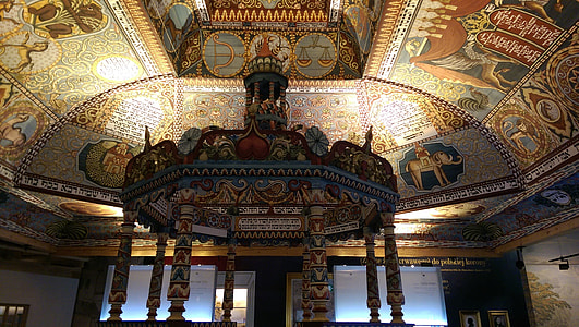 multicolored altar inside room thumbnail