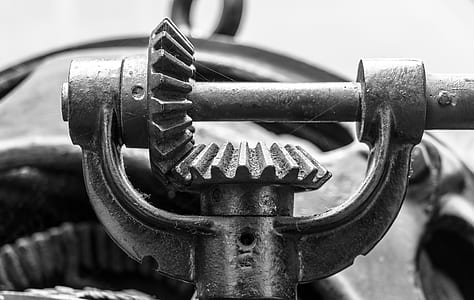 macro photography of gray metal bevel gear thumbnail