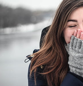 woman in blue and grey jacket thumbnail