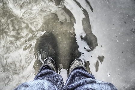 person standing on flooded floor thumbnail