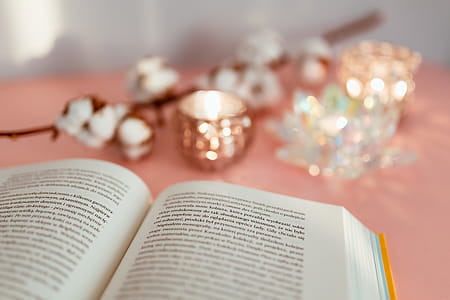 Open book on a pink background thumbnail