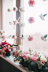 Multi-colored flowers in vases thumbnail