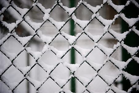 snow on cyclone fence thumbnail
