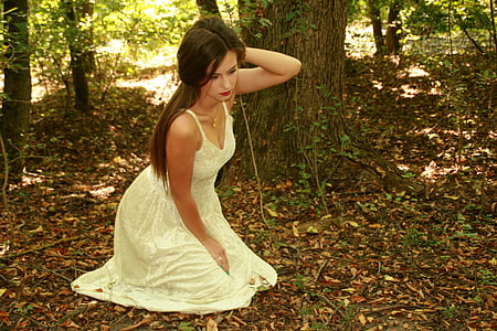 woman in white spaghetti strap thumbnail