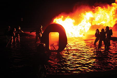 fire fighter near flame thumbnail