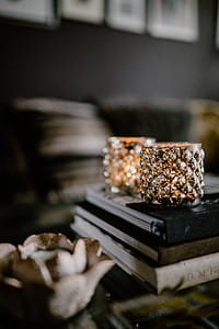 Decanter, candles, and a painting on the wall thumbnail