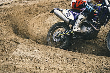 man riding dirt motorcycle thumbnail