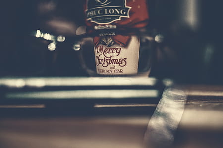 Merry Christmas bottle on table thumbnail