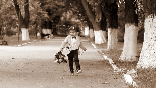 gray scale photo of boy wearing formal outfit thumbnail