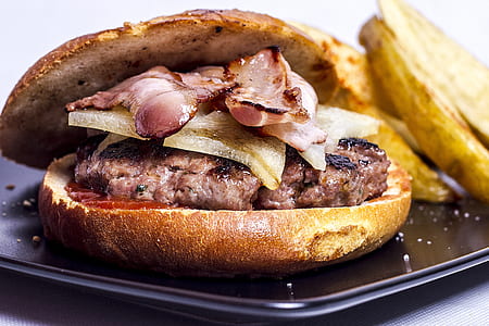 burger with bacon and patty served on plate thumbnail