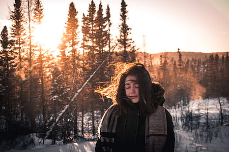 woman in black jacket during sunrise thumbnail