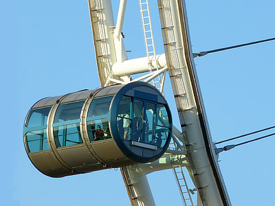 people inside black and blue ferriswheel thumbnail