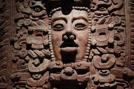 brown concrete mask statue thumbnail