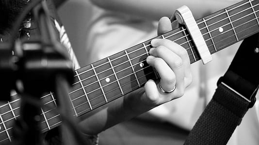 person performing guitar thumbnail