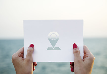 person holding paper with drop logo thumbnail