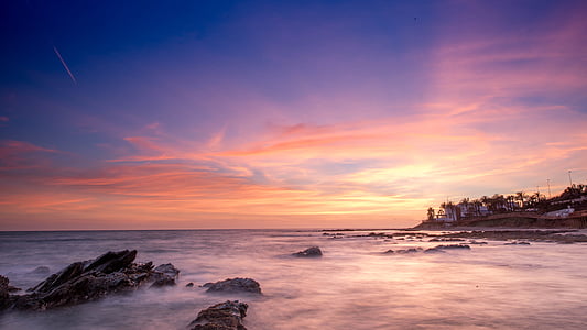photo of seawaves and boulders thumbnail