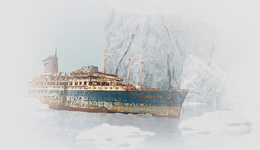 white and blue cruise ship beside iceberg thumbnail