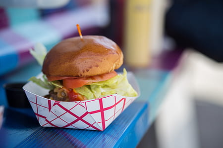 selective focus photography of hamburger on box thumbnail