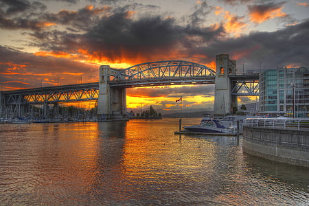 gray concrete bridge during sunset thumbnail